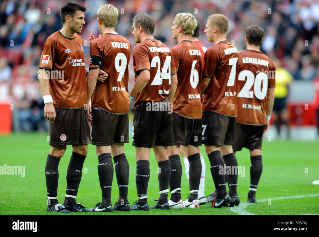 players-of-fc-st-pauli-building-a-defense-wall-BR376J